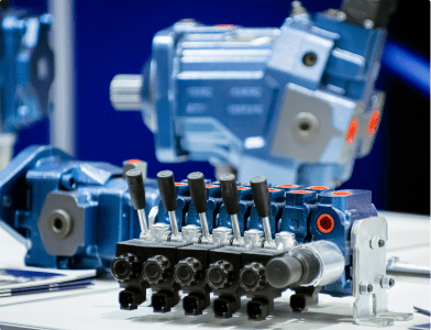 A display of hydraulic pumps showcased at a hydraulic distributor, highlighting various models and features.